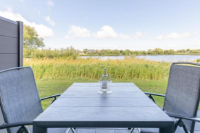Ferienwohnung Nordseetraum direkt am Nordseedeich mit Blick auf den See